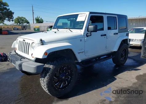 2010 Jeep Wrangler Unlimited Sahara from USA, damaged, VIN 1J4HA5H1XAL184402